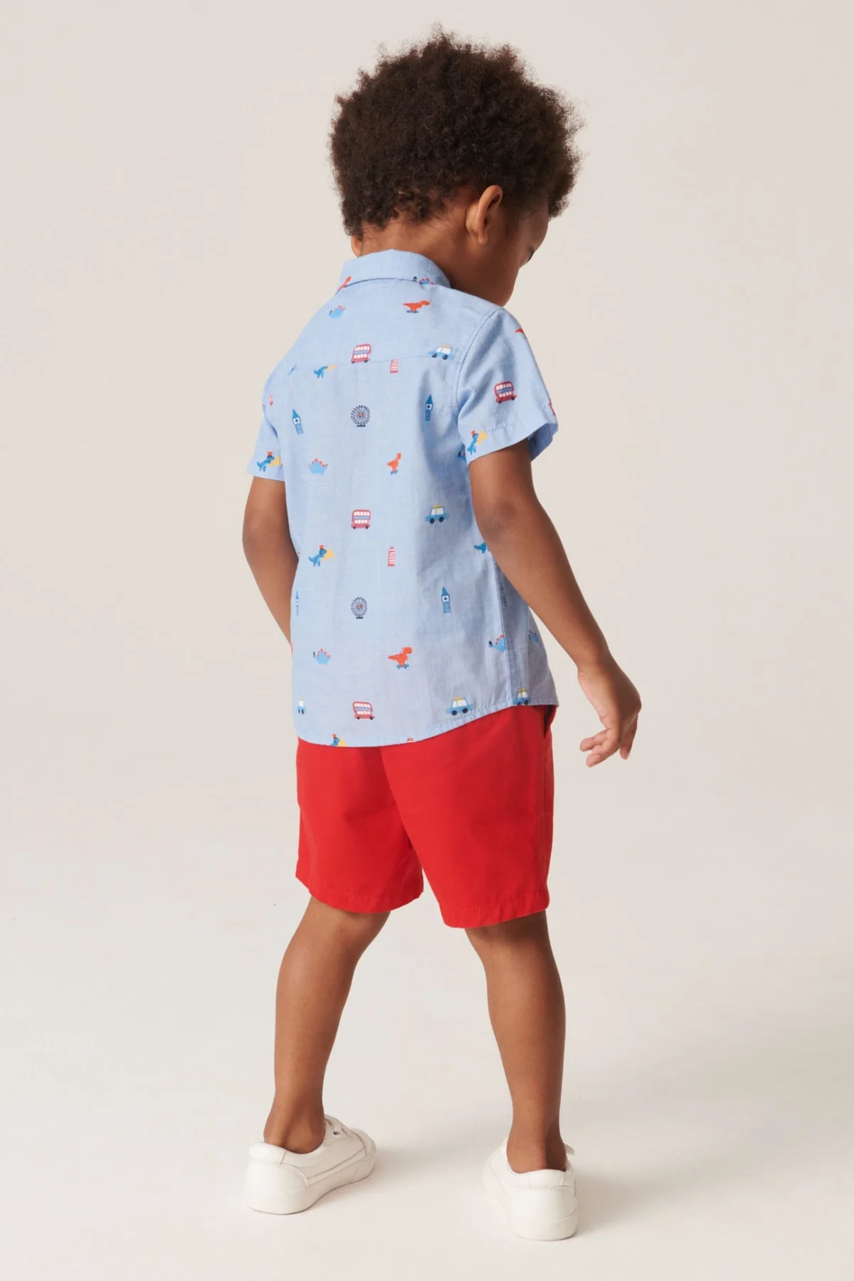 official set red shirt and shorts with dinosaur design