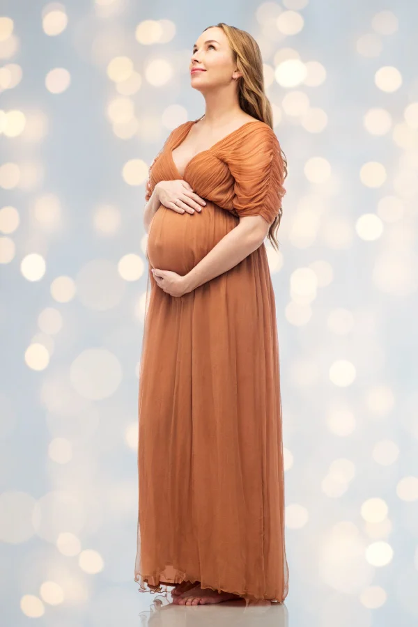 pregnant woman lights background